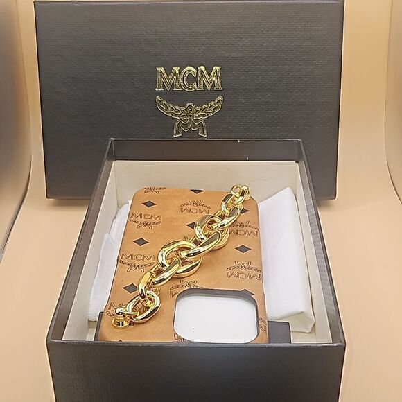 MCM Iphone 12 Pro case w/ gold chain handle . Dust bag and Card w/ box. - Picture 2 of 3